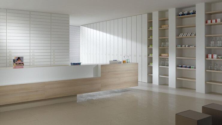Impressionen einer Apothekeneinrichtung Impressionen einer Apothekeneinrichtung mit hellen Holzmöbeln und geräumigem Regalsystem, sowie aufgeräumten Empfang.